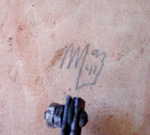 initials found on the bottom of the playfield