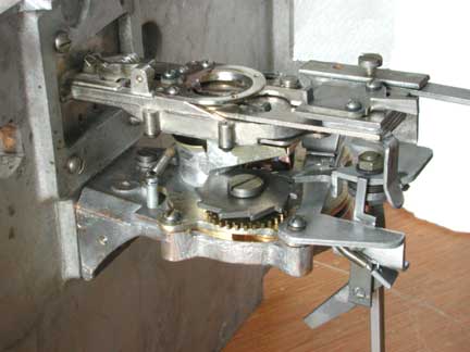 coin slide and coin rejector mounted on front panel