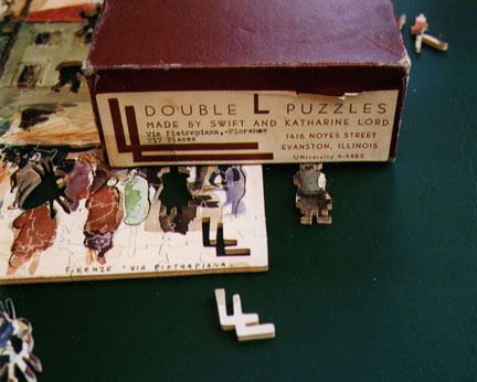Double L puzzles box and pieces